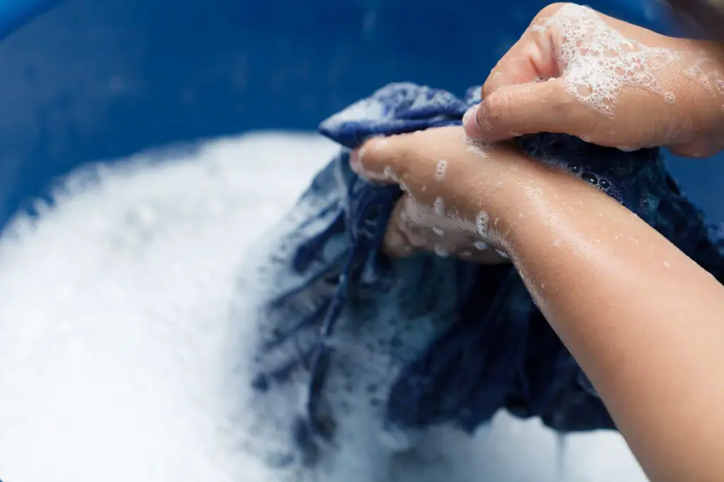 woman hands washing wader