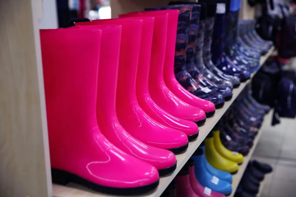 colorful rubber boots at wholesale market