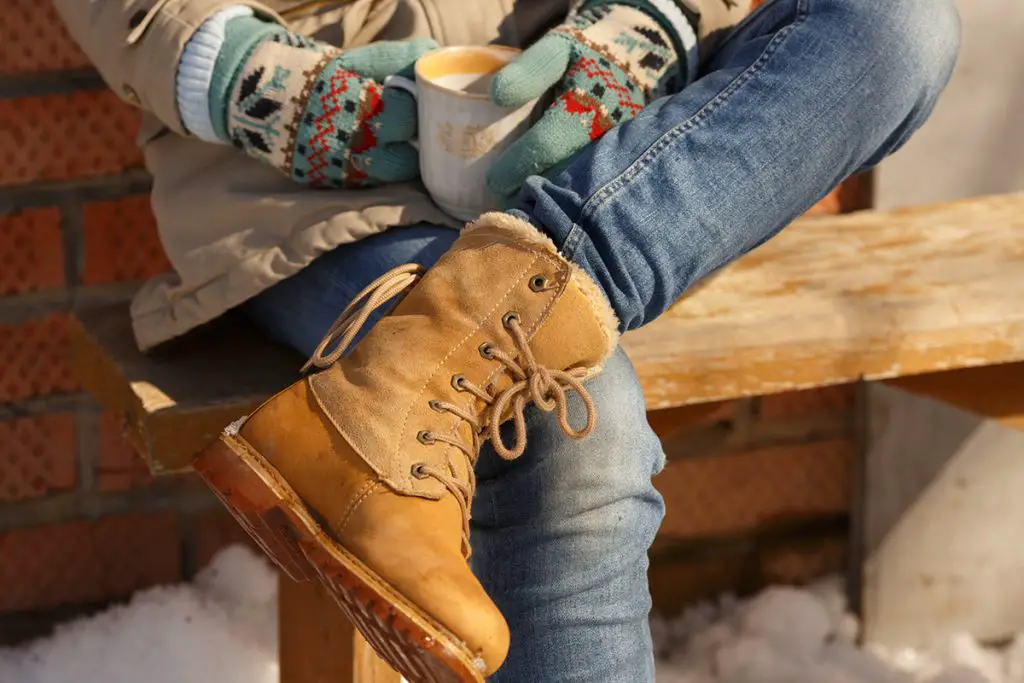 woman wearing pants with boots