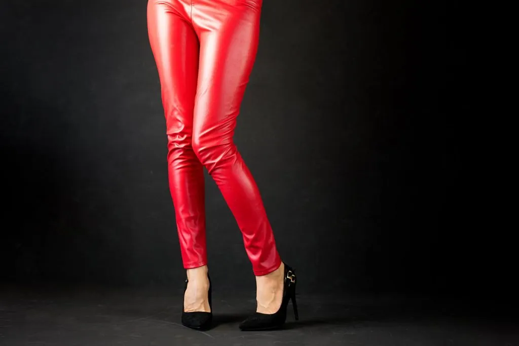 woman in red leather pants and red high heel shoes