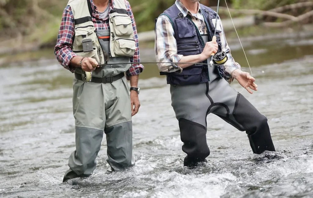 two fishermen wearing waders