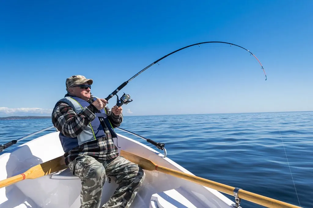 senior sea fishing action