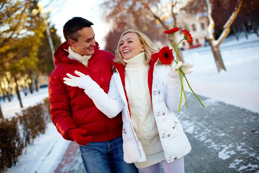 happy man and pretty woman walking outdoor in winter in Vegas