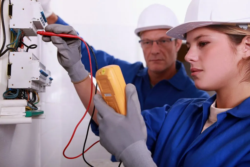 electrician using a multimeter