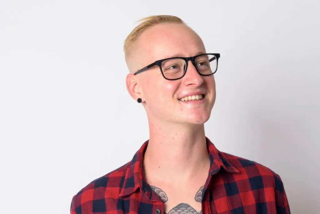 male teacher with earrings