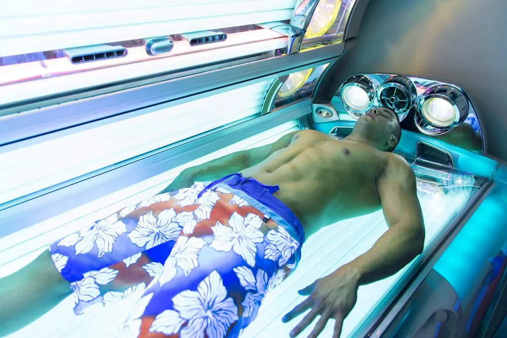 man in a tanning bed