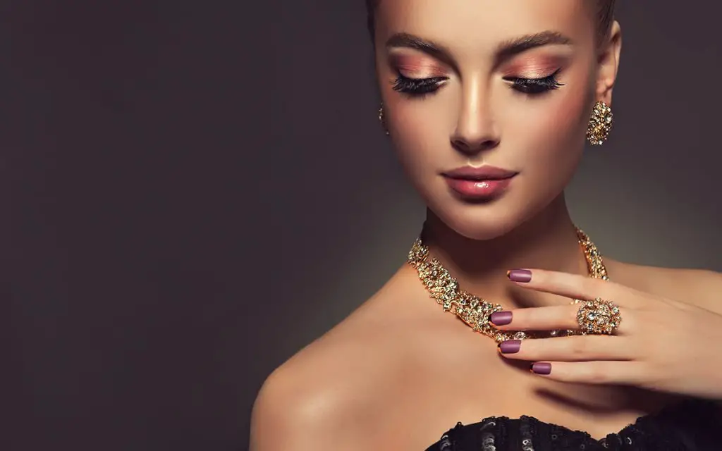 beautiful girl with jewelry - necklace, earrings, and bracelet