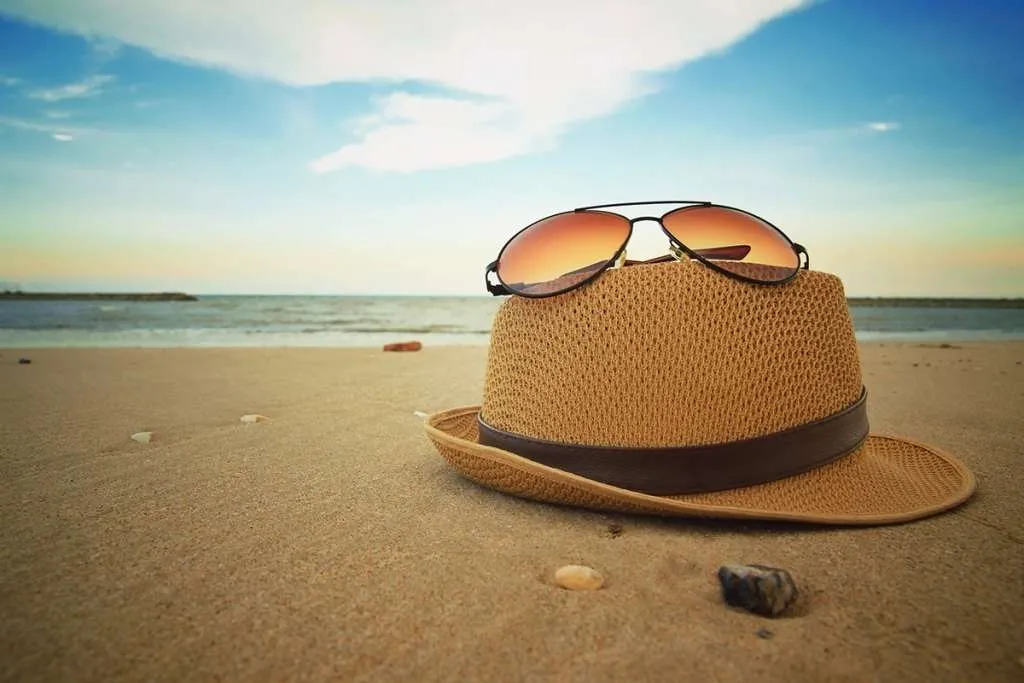 beach items on smooth sand