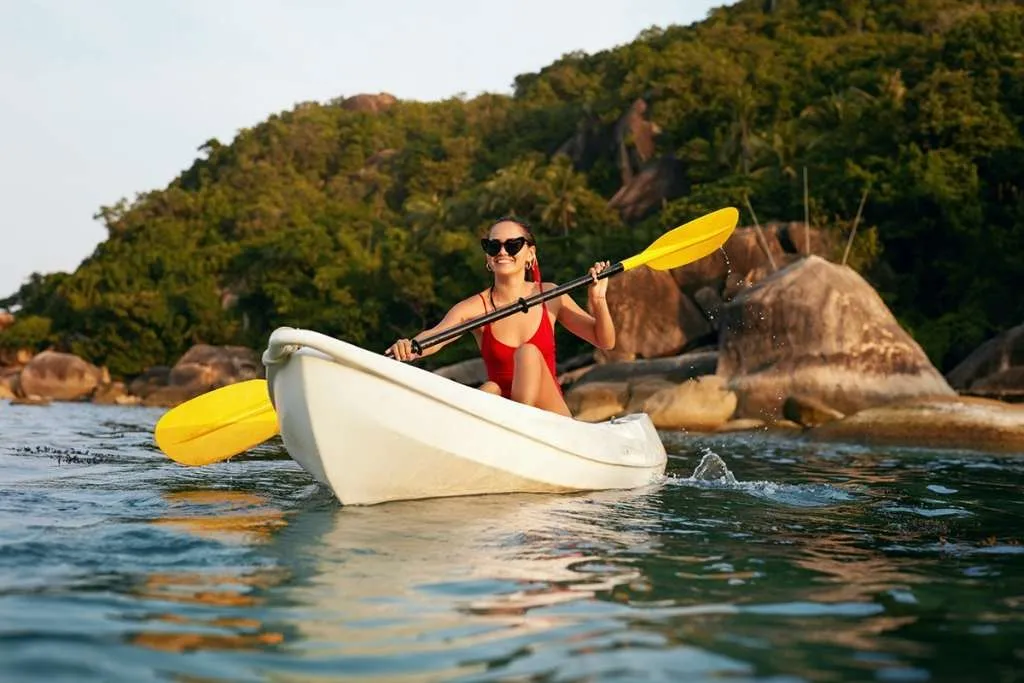 woman traveling in kayak